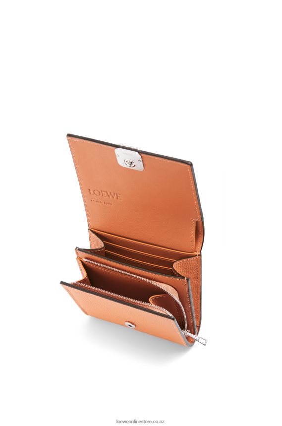 Loewe Women Anagram compact flap wallet in pebble grain calfskin Coral Reef LH60R1307