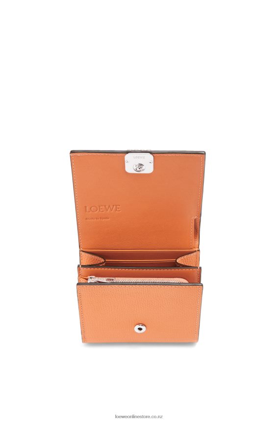 Loewe Women Anagram compact flap wallet in pebble grain calfskin Coral Reef LH60R1307