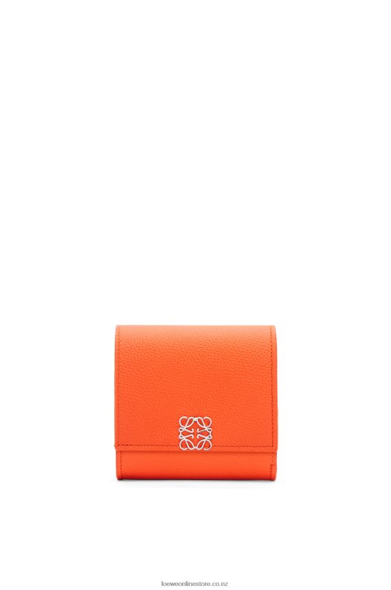 Loewe Women Anagram compact flap wallet in pebble grain calfskin Orange LH60R1294