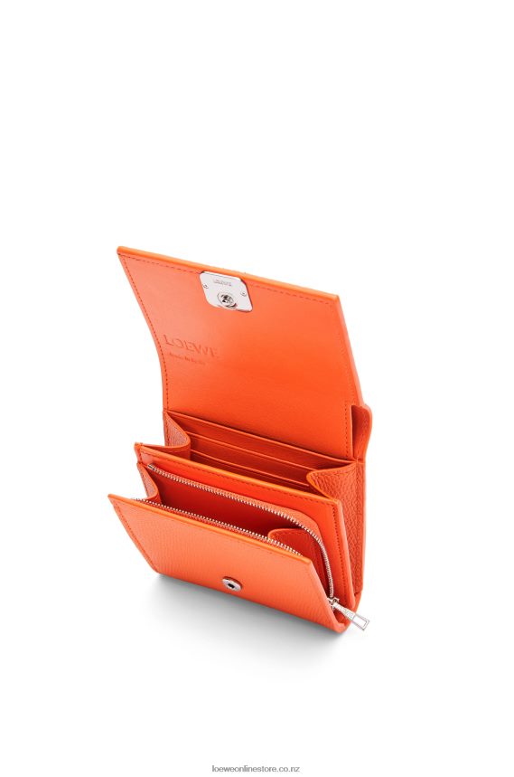 Loewe Women Anagram compact flap wallet in pebble grain calfskin Orange LH60R1294