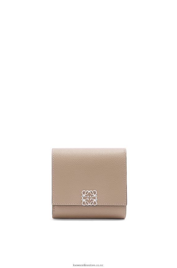 Loewe Women Anagram compact flap wallet in pebble grain calfskin Sand LH60R1215
