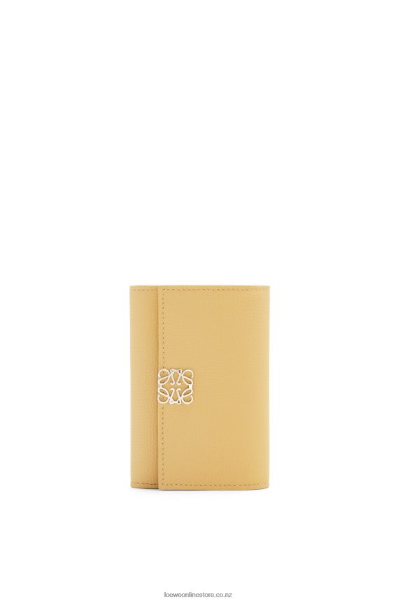 Loewe Women Anagram small vertical wallet in pebble grain calfskin Dark Butter LH60R1264