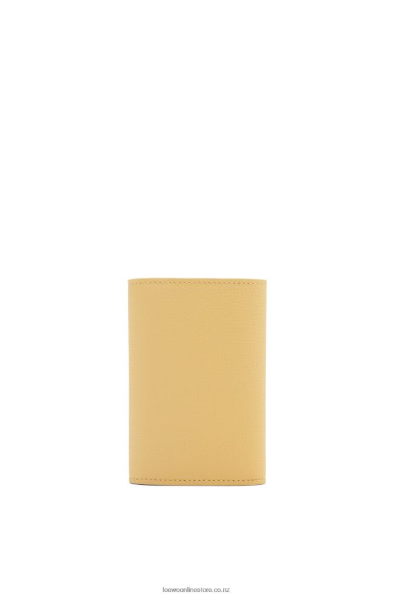 Loewe Women Anagram small vertical wallet in pebble grain calfskin Dark Butter LH60R1264