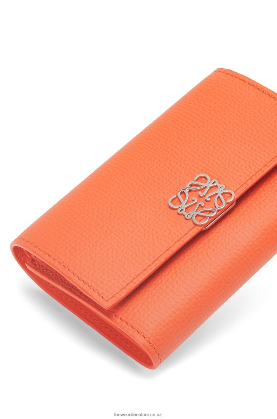 Loewe Women Anagram small vertical wallet in pebble grain calfskin Orange LH60R1292